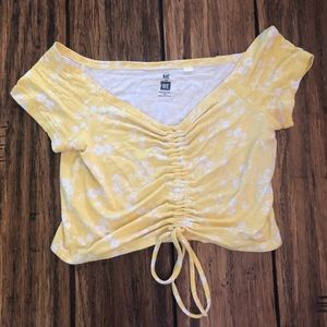yellow and white flower crop top